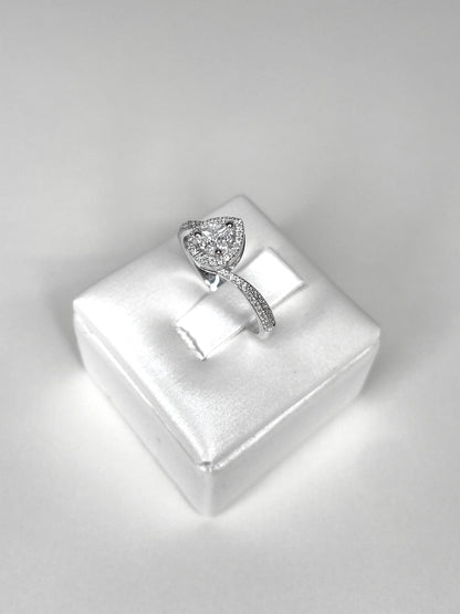 Anello solitario goccia e dimanti