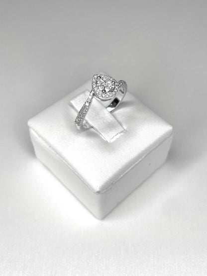 Anello solitario goccia e dimanti