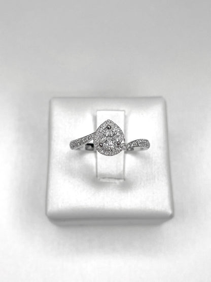 Anello solitario goccia e dimanti